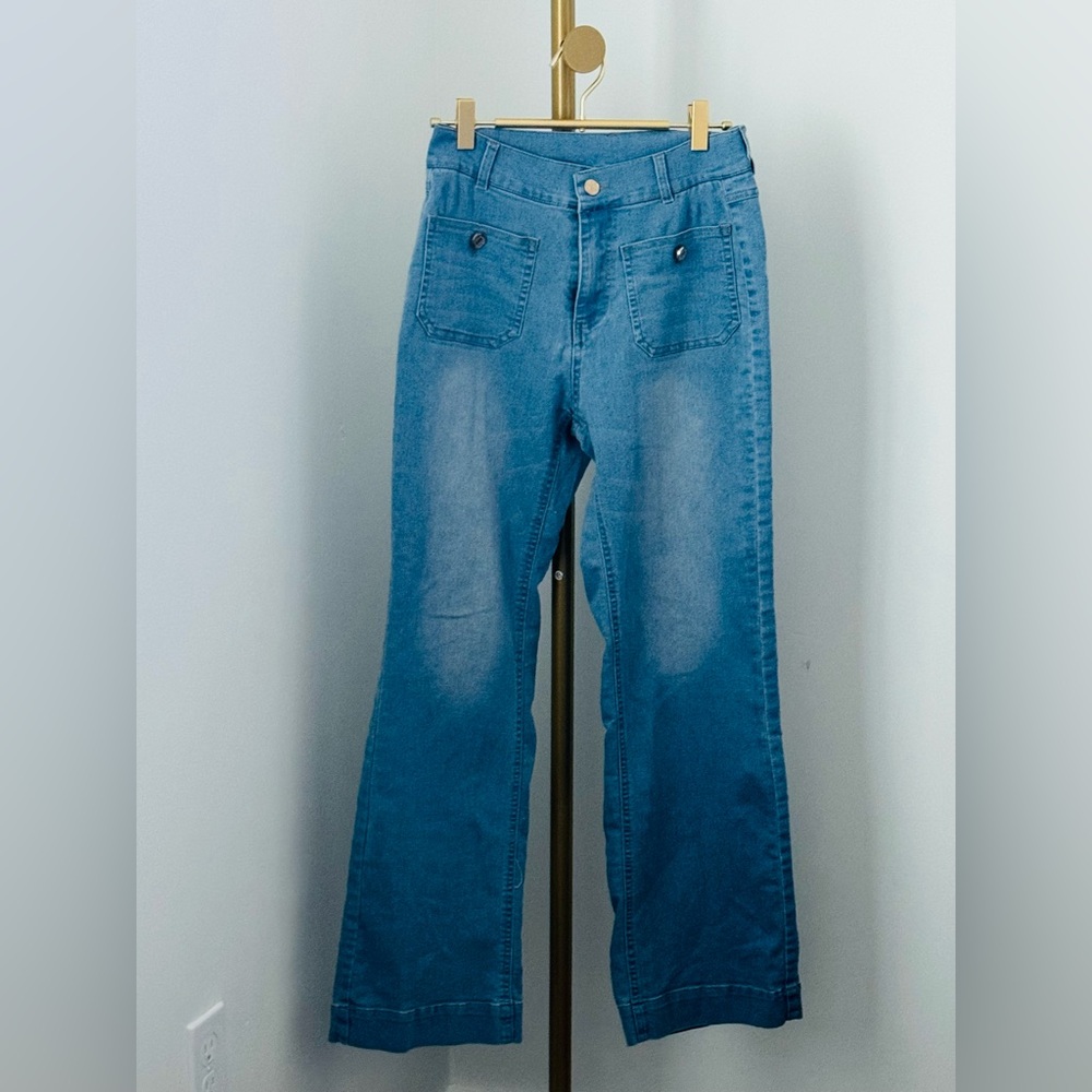 Distressed light blue denim jeans. Lightweight and comfy!